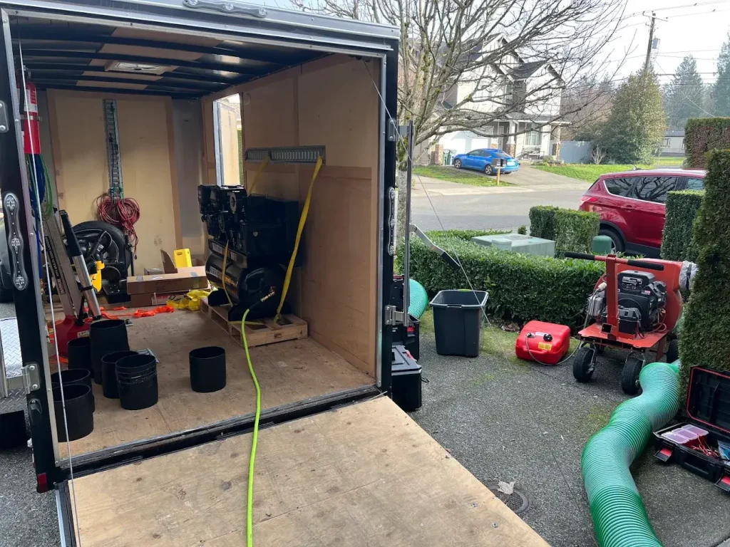 Open trailer with equipment inside