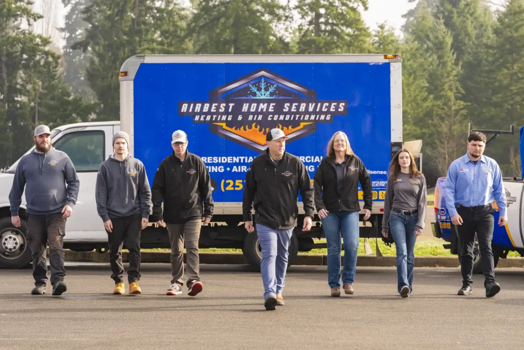 Group walking near service vehicle.