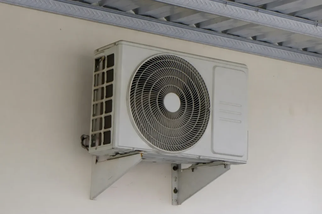 Wall-mounted air conditioning unit installed.